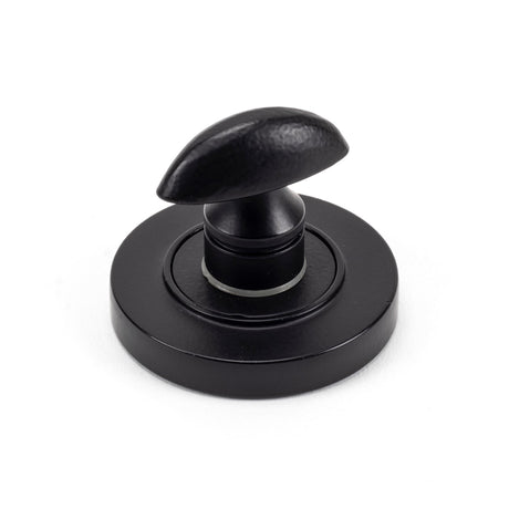 From The Anvil - Matt Black Round Thumbturn Set (Plain) | Sku. 49544 | Trade Door Handles.