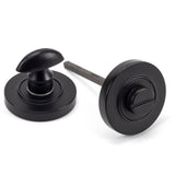 From The Anvil - Matt Black Round Thumbturn Set (Plain) | Sku. 49544 | Trade Door Handles.