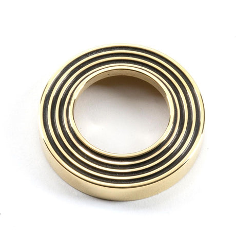 From The Anvil - Aged Brass Avon Round Lever on Rose Set (Beehive) - Unsprung | Sku. 49947 | Trade Door Handles.