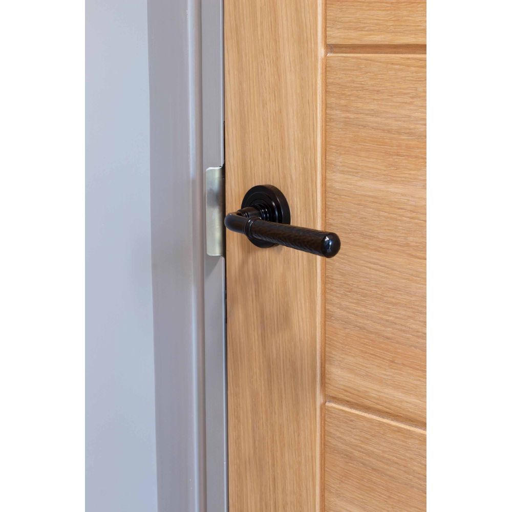 From The Anvil - Black Hammered Newbury Lever on Rose Set (Art Deco) - Unsprung | Sku. 49982 | Trade Door Handles.