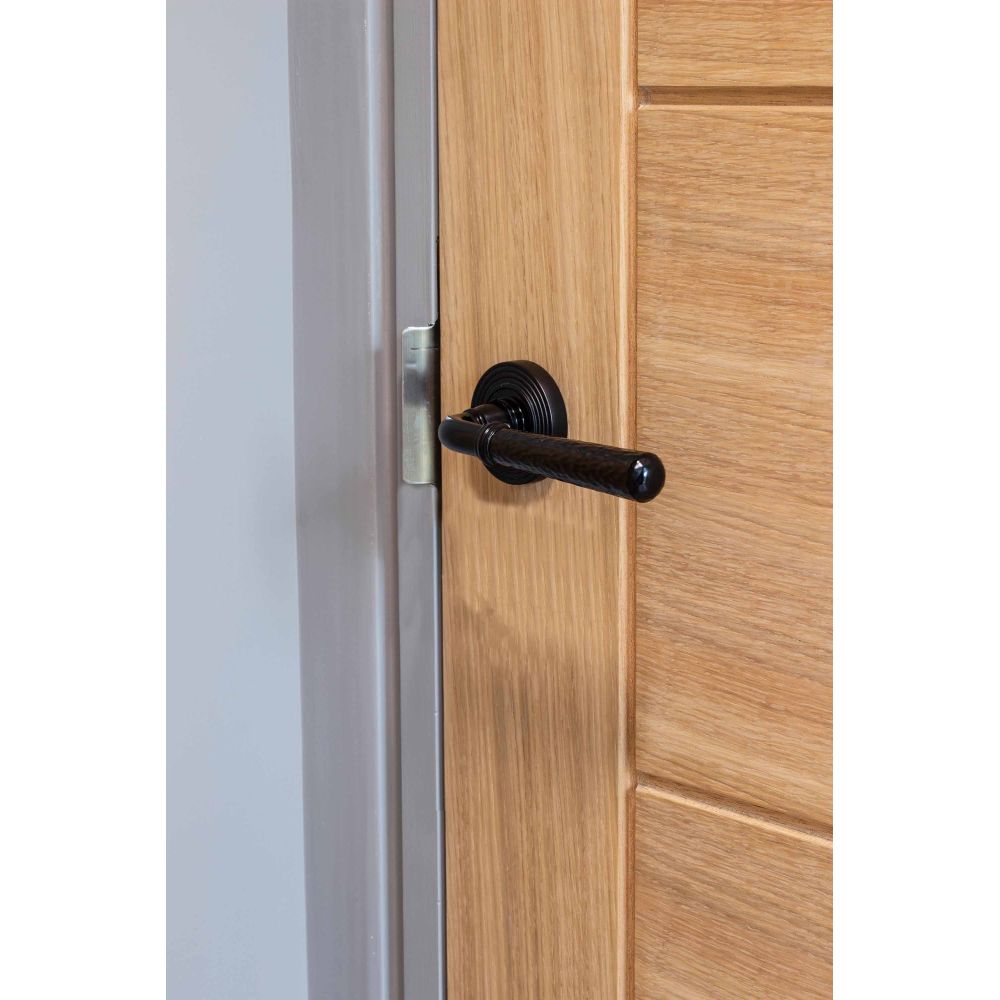 From The Anvil - Black Hammered Newbury Lever on Rose Set (Beehive) - Unsprung | Sku. 49983 | Trade Door Handles.