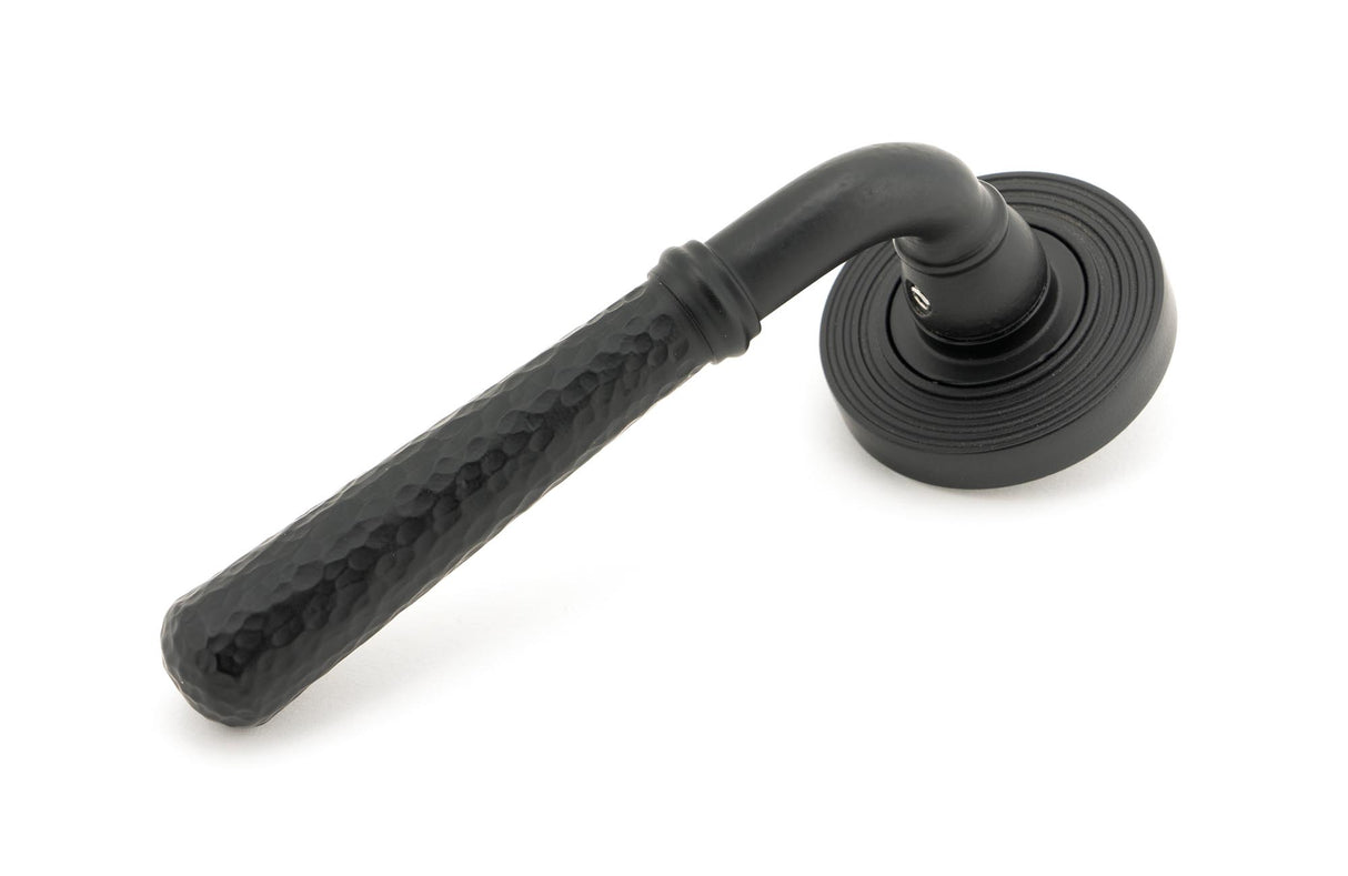 From The Anvil - Matt Black Hammered Newbury Lever on Rose Set (Beehive) - Unsprung | Sku. 49987 | Trade Door Handles.