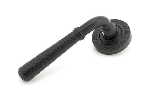 From The Anvil - Matt Black Hammered Newbury Lever on Rose Set (Beehive) - Unsprung | Sku. 49987 | Trade Door Handles.