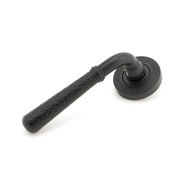 From The Anvil - Matt Black Hammered Newbury Lever on Rose Set (Beehive) - Unsprung | Sku. 49987 | Trade Door Handles.