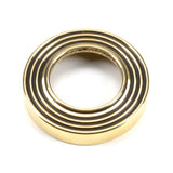 From The Anvil - Aged Brass Brompton Lever on Rose Set (Beehive) - Unsprung | Sku. 49995 | Trade Door Handles.