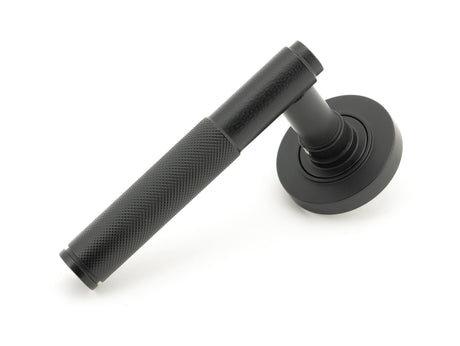 From The Anvil - Matt Black Brompton Lever on Rose Set (Plain) - Unsprung | Sku. 50009 | Trade Door Handles.