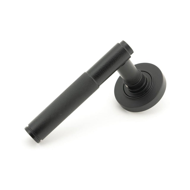From The Anvil - Matt Black Brompton Lever on Rose Set (Plain) - Unsprung | Sku. 50009 | Trade Door Handles.