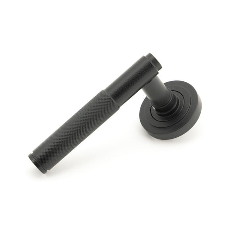 From The Anvil - Matt Black Brompton Lever on Rose Set (Art Deco) - Unsprung | Sku. 50010 | Trade Door Handles.