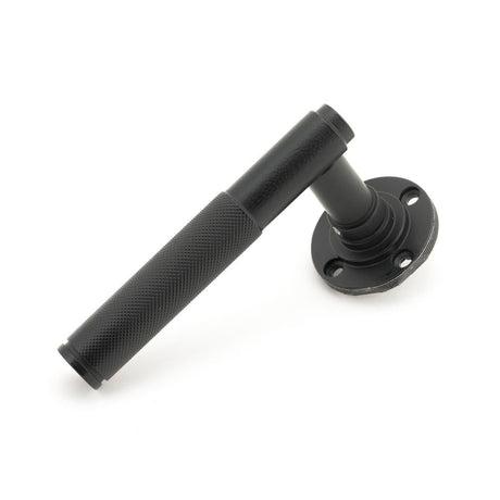 From The Anvil - Matt Black Brompton Lever on Rose Set (Beehive) - Unsprung | Sku. 50011 | Trade Door Handles.