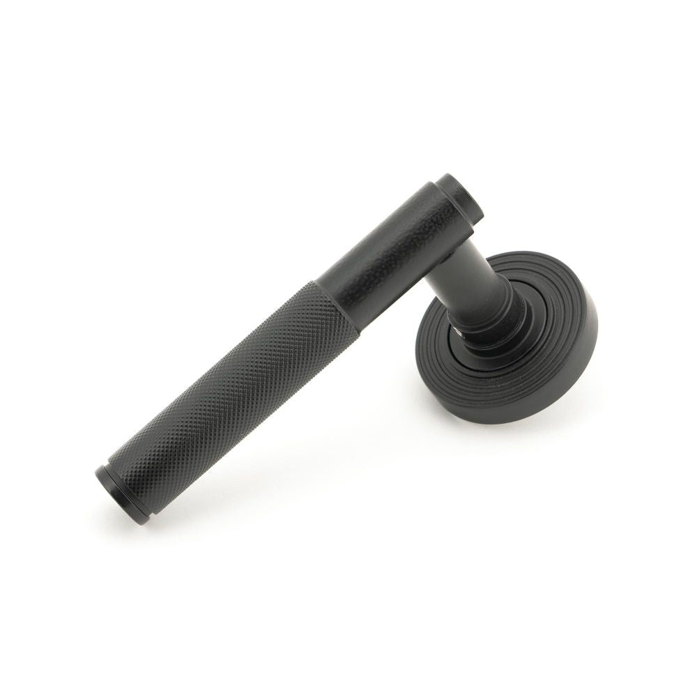 From The Anvil - Matt Black Brompton Lever on Rose Set (Beehive) - Unsprung | Sku. 50011 | Trade Door Handles.