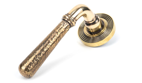 From The Anvil - Aged Brass Hammered Newbury Lever on Rose Set (Beehive) - Unsprung | Sku. 50039 | Trade Door Handles.