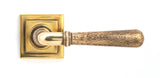 From The Anvil - Aged Brass Hammered Newbury Lever on Rose Set (Square) - Unsprung | Sku. 50040 | Trade Door Handles.