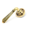 From The Anvil - Aged Brass Hinton Lever on Rose Set - Unsprung | Sku. 50081 | Trade Door Handles.