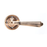From The Anvil - Polished Bronze Hinton Lever on Rose Set - Unsprung | Sku. 50085 | Trade Door Handles.