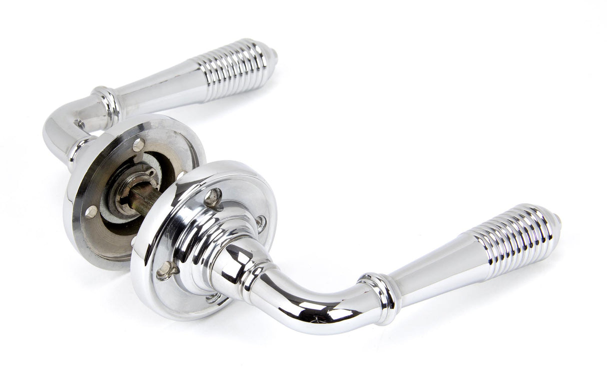 From The Anvil - Polished Chrome Reeded Lever on Rose Set - Unsprung | Sku. 50088 | Trade Door Handles.