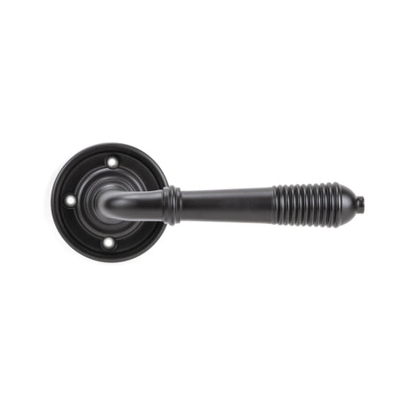 From The Anvil - Aged Bronze Reeded Lever on Rose Set - Unsprung | Sku. 50089 | Trade Door Handles.