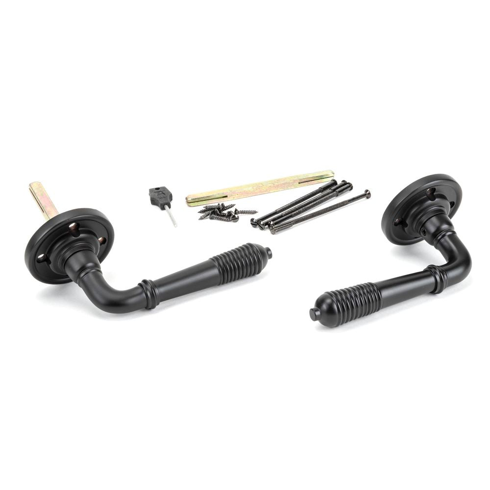 From The Anvil - Aged Bronze Reeded Lever on Rose Set - Unsprung | Sku. 50089 | Trade Door Handles.
