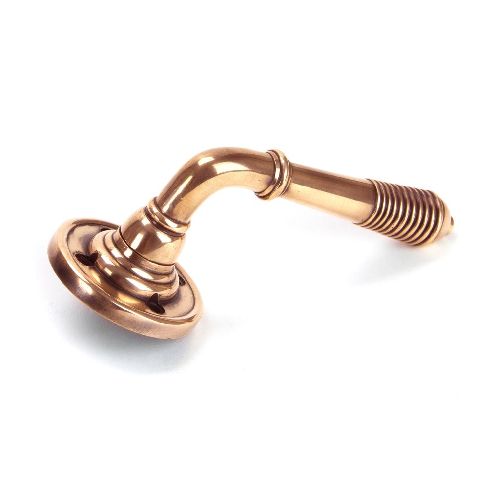From The Anvil - Polished Bronze Reeded Lever on Rose Set - Unsprung | Sku. 50090 | Trade Door Handles.