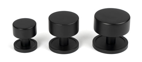 From The Anvil - Matt Black Kelso Cabinet Knob - 25mm (Plain) | Sku. 50337 | Trade Door Handles.
