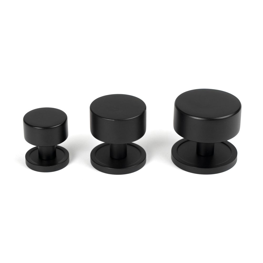 From The Anvil - Matt Black Kelso Cabinet Knob - 32mm (Plain) | Sku. 50340 | Trade Door Handles.