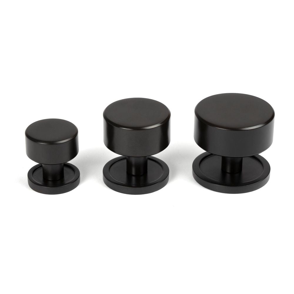 From The Anvil - Aged Bronze Kelso Cabinet Knob - 25mm (Plain) | Sku. 50436 | Trade Door Handles.