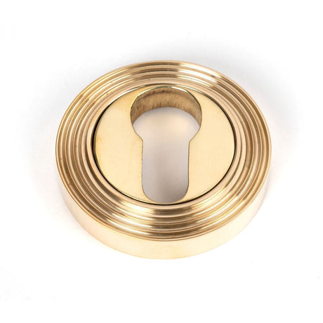 From The Anvil - Polished Brass Round Euro Escutcheon (Beehive) | Sku. 50594 | Trade Door Handles.