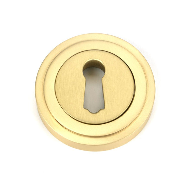 From The Anvil - Satin Brass Round Escutcheon (Art Deco) | Sku. 50873 | Trade Door Handles.