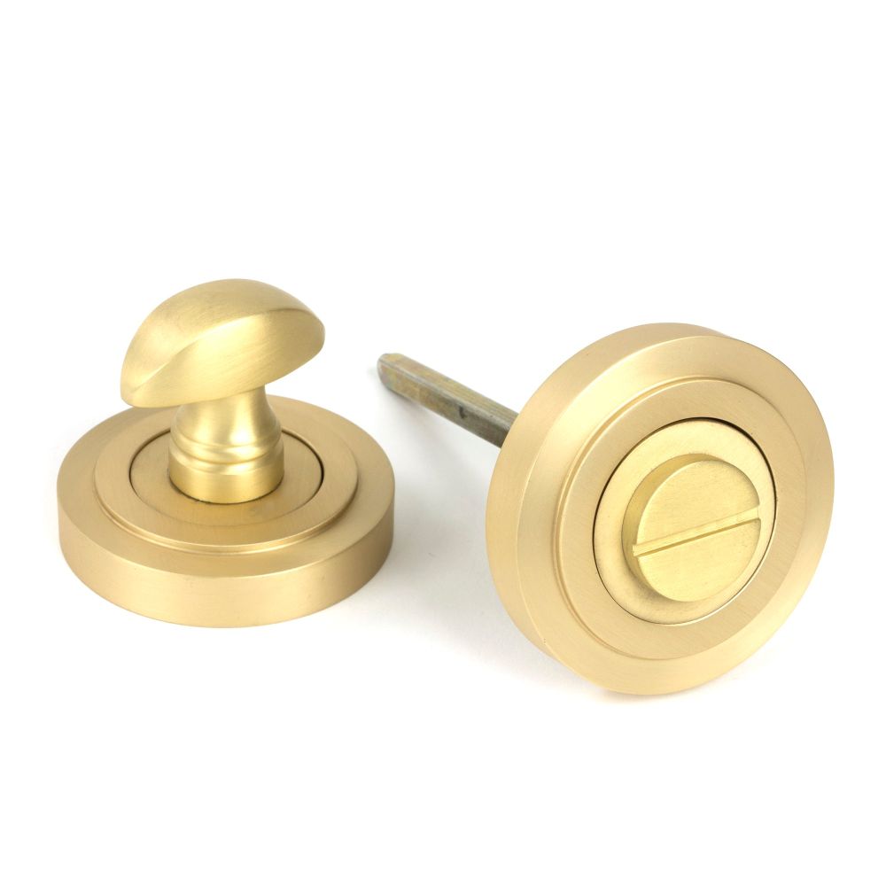 From The Anvil - Satin Brass Round Thumbturn Set (Art Deco) | Sku. 50881 | Trade Door Handles.