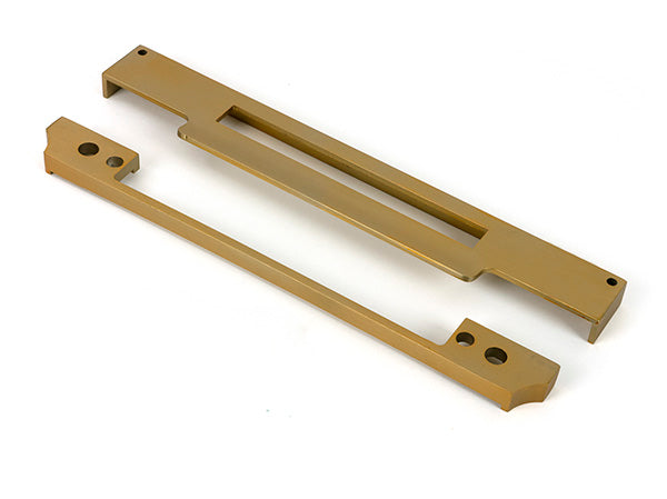 This is an image of From The Anvil - Satin Brass ½" Rebate Kit for Euro Din Sash Lock available to order from Trade Door Handles in Kendal.