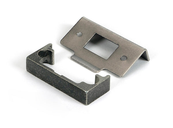 This is an image of From The Anvil - Pewter Â½" Rebate Kit for Tubular Mortice Latch available to order from Trade Door Handles in Kendal.