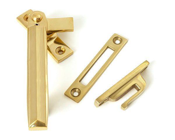 This is an image of From The Anvil - Polished Brass Locking Art Deco Fastener - LH available to order from Trade Door Handles in Kendal.