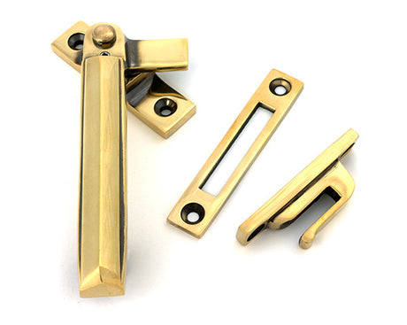 This is an image of From The Anvil - Aged Brass Locking Art Deco Fastener - LH available to order from Trade Door Handles in Kendal.