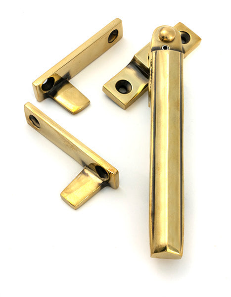 This is an image of From The Anvil - Aged Brass Night-Vent Locking Art Deco Fastener available to order from Trade Door Handles in Kendal.