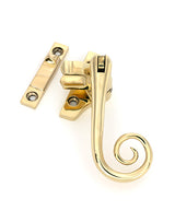 This is an image of From The Anvil - Polished Brass Night-Vent Locking Monkeytail Fastener (Steel Window) available to order from Trade Door Handles in Kendal.