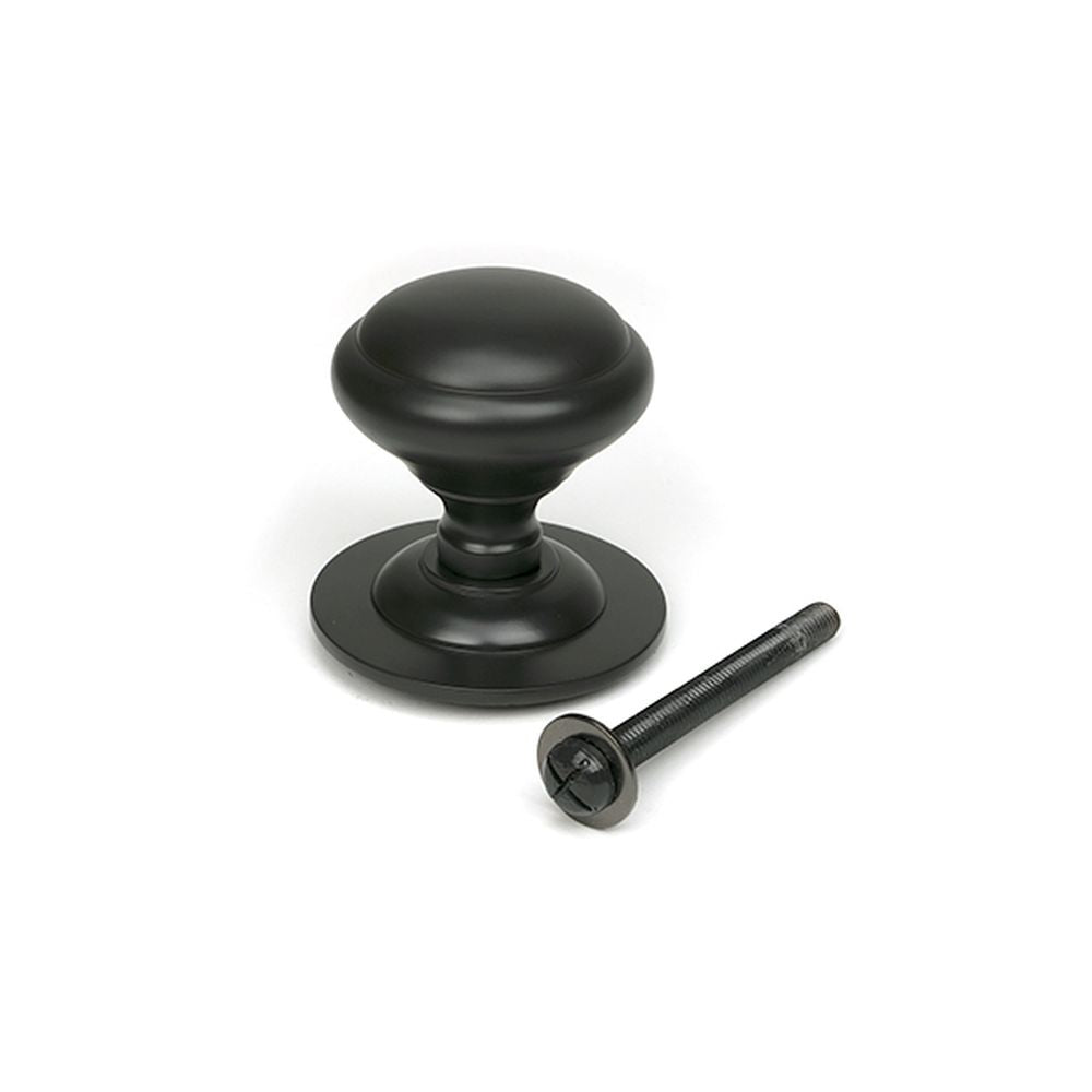 High quality images of the From The Anvil - Aged Bronze Round Centre Door Knob | Sku. Anvil-52136 | available to order from Trade Door Handles, quick delivery at discounted prices.