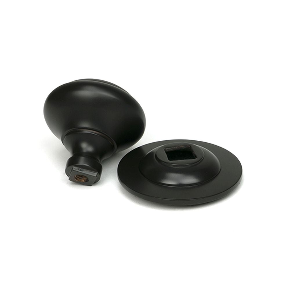 High quality images of the From The Anvil - Aged Bronze Round Centre Door Knob | Sku. Anvil-52136 | available to order from Trade Door Handles, quick delivery at discounted prices.