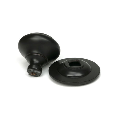 High quality images of the From The Anvil - Aged Bronze Round Centre Door Knob | Sku. Anvil-52136 | available to order from Trade Door Handles, quick delivery at discounted prices.