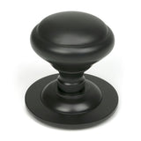 High quality images of the From The Anvil - Aged Bronze Round Centre Door Knob | Sku. Anvil-52136 | available to order from Trade Door Handles, quick delivery at discounted prices.