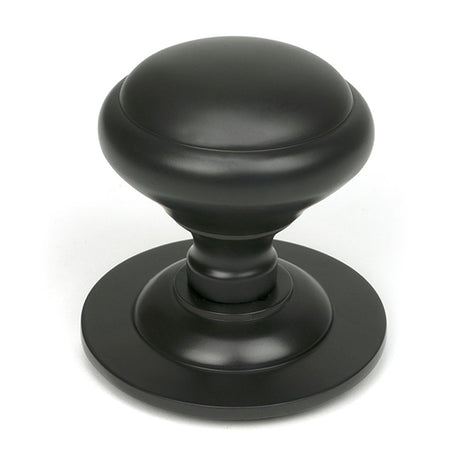High quality images of the From The Anvil - Aged Bronze Round Centre Door Knob | Sku. Anvil-52136 | available to order from Trade Door Handles, quick delivery at discounted prices.