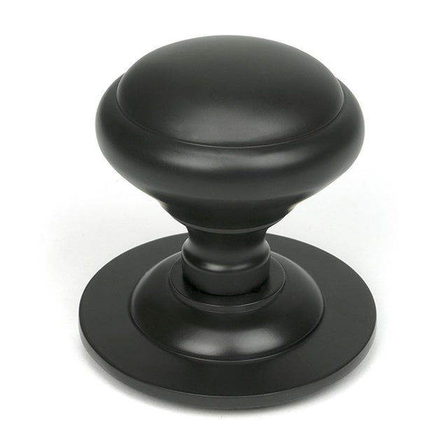 High quality images of the From The Anvil - Aged Bronze Round Centre Door Knob | Sku. Anvil-52136 | available to order from Trade Door Handles, quick delivery at discounted prices.
