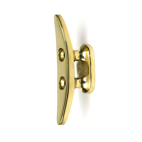 High quality images of the From The Anvil - Polished Brass Marine Cleat Hook | Sku. Anvil-52239 | available to order from Trade Door Handles, quick delivery at discounted prices.