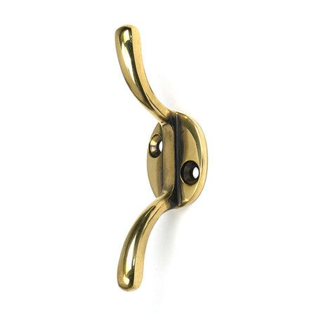 High quality images of the From The Anvil - Aged Brass Newbury Cleat Hook | Sku. Anvil-52248 | available to order from Trade Door Handles, quick delivery at discounted prices.