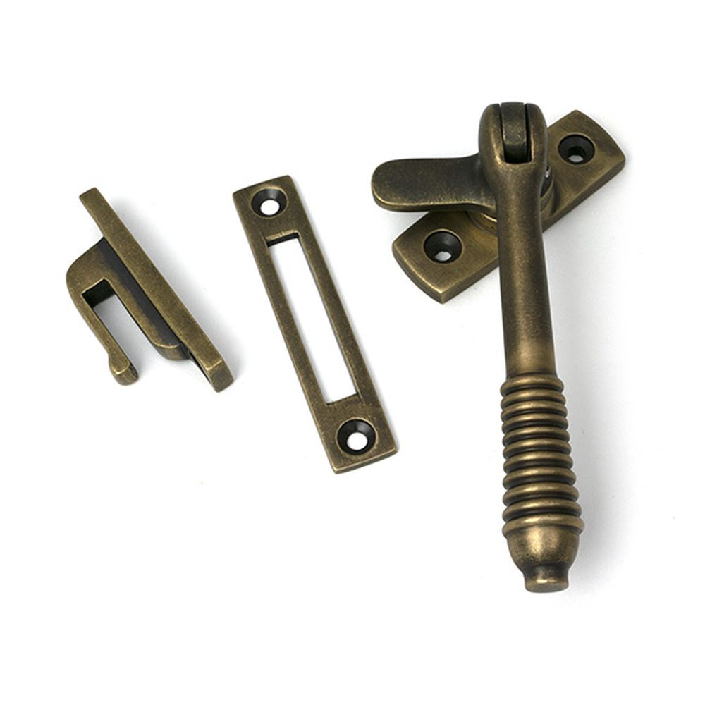 High quality images of the From The Anvil - Burnished Brass Locking Reeded Fastener | Sku. Anvil-52318 | available to order from Trade Door Handles, quick delivery at discounted prices.