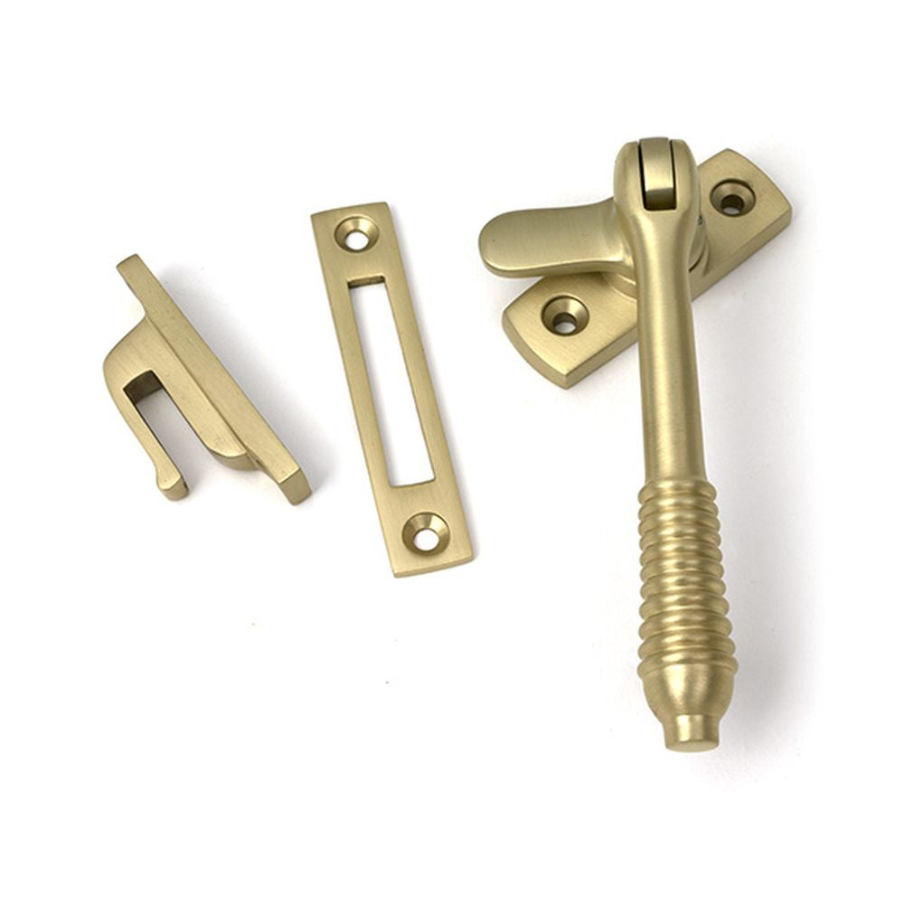 High quality images of the From The Anvil - Satin Brass Locking Reeded Fastener | Sku. Anvil-52319 | available to order from Trade Door Handles, quick delivery at discounted prices.