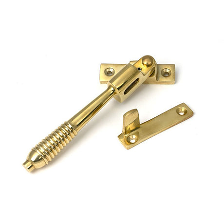 High quality images of the From The Anvil - Polished Brass Night-Vent Locking Reeded Fastener | Sku. Anvil-52320 | available to order from Trade Door Handles, quick delivery at discounted prices.