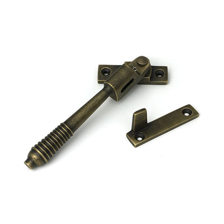 High quality images of the From The Anvil - Burnished Brass Night-Vent Locking Reeded Fastener | Sku. Anvil-52321 | available to order from Trade Door Handles, quick delivery at discounted prices.