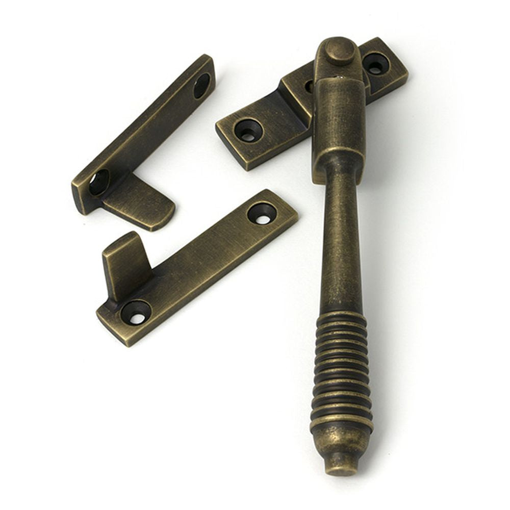 High quality images of the From The Anvil - Burnished Brass Night-Vent Locking Reeded Fastener | Sku. Anvil-52321 | available to order from Trade Door Handles, quick delivery at discounted prices.