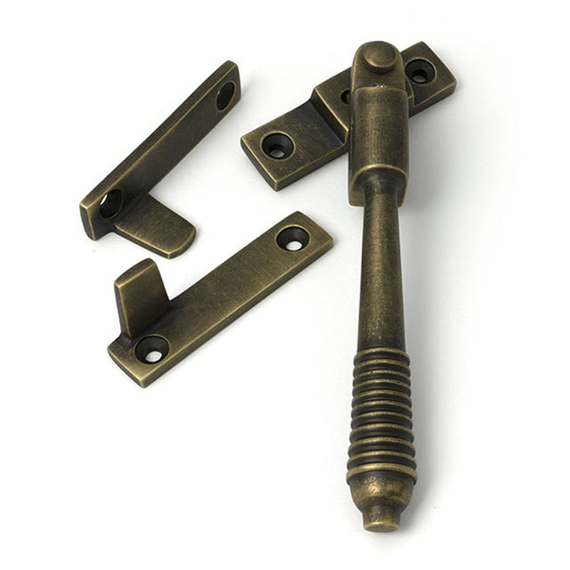 High quality images of the From The Anvil - Burnished Brass Night-Vent Locking Reeded Fastener | Sku. Anvil-52321 | available to order from Trade Door Handles, quick delivery at discounted prices.