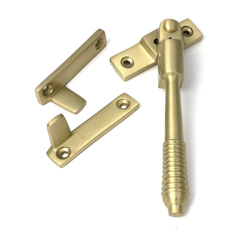 High quality images of the From The Anvil - Satin Brass Night-Vent Locking Reeded Fastener | Sku. Anvil-52322 | available to order from Trade Door Handles, quick delivery at discounted prices.