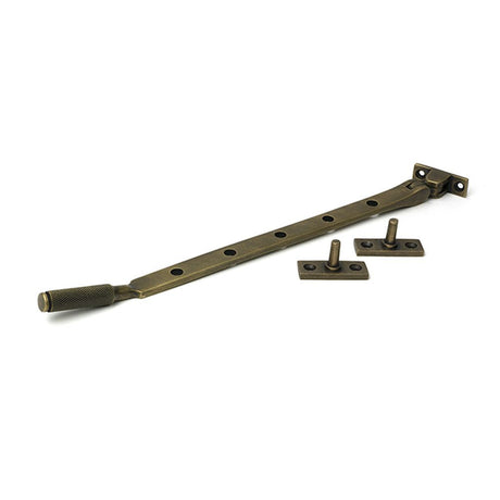 High quality images of the From The Anvil - Burnished Brass 12" Brompton Stay | Sku. Anvil-52325 | available to order from Trade Door Handles, quick delivery at discounted prices.